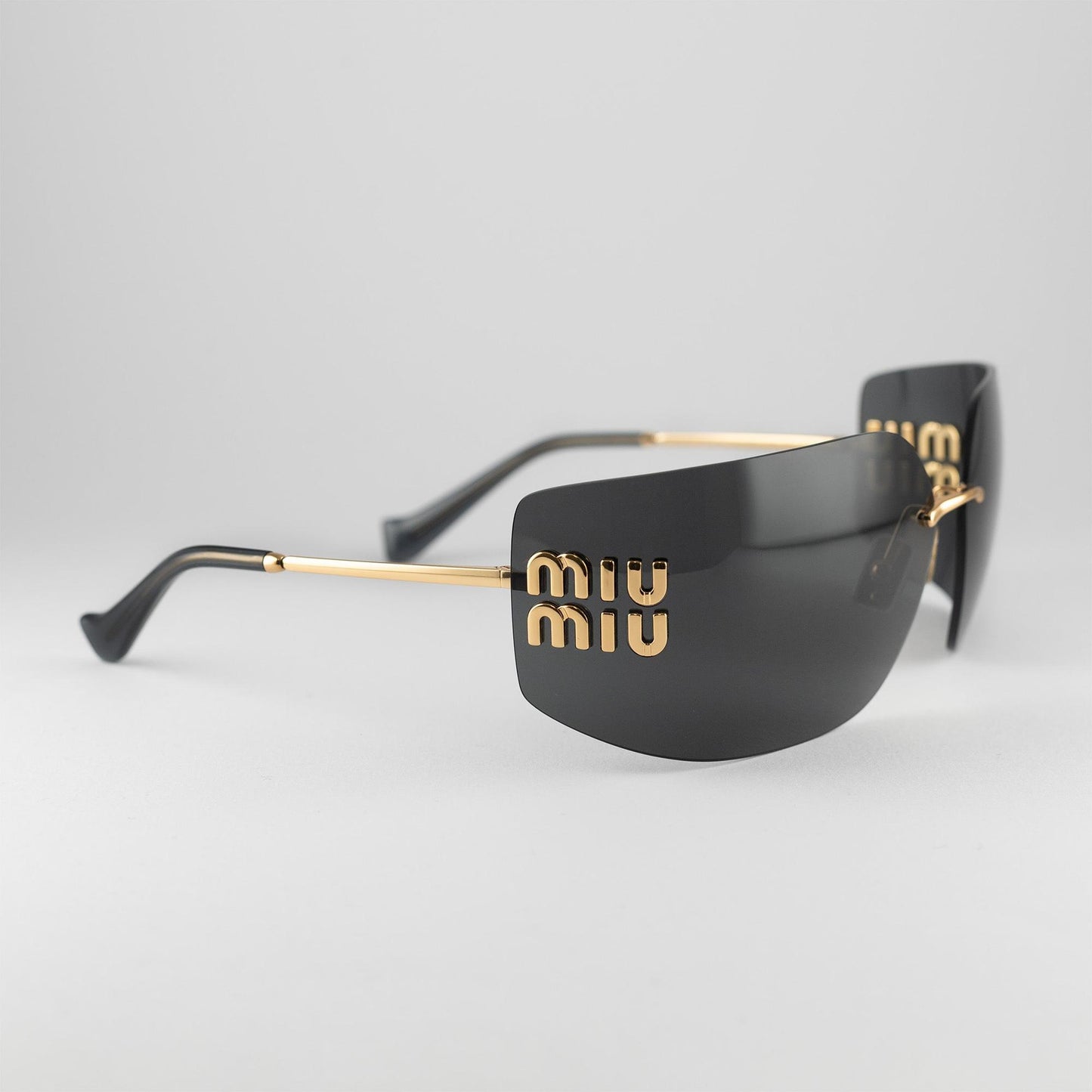 Occhiale da sole Miu Miu SMU 54YS 5AK-5S0 Black - lato - Shop Ottica Mineo