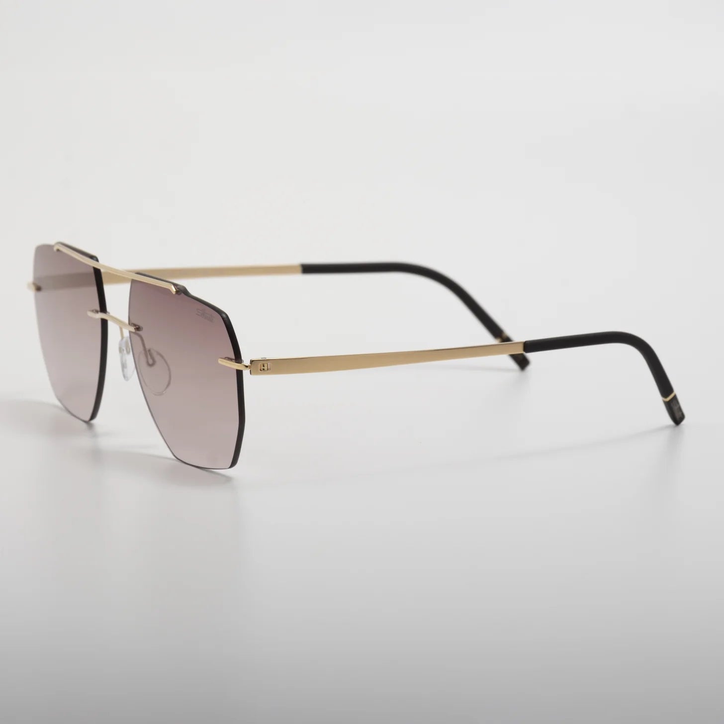 Occhiale da sole Silhouette Rincon 8746 75 7620 Gold / Darkbrown - lato - Shop Ottica Mineo
