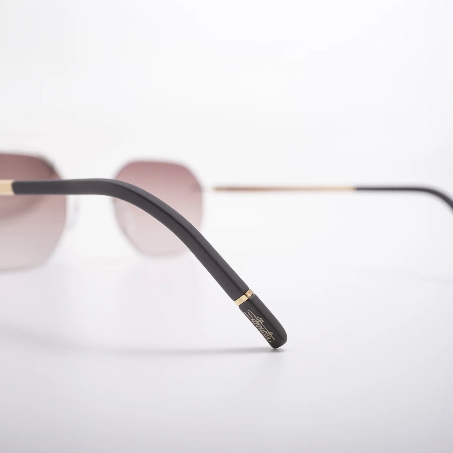 Occhiale da sole Silhouette Cabrillo 8748 75 7520 Gold / Darkbrown - dettaglio - Shop Ottica Mineo
