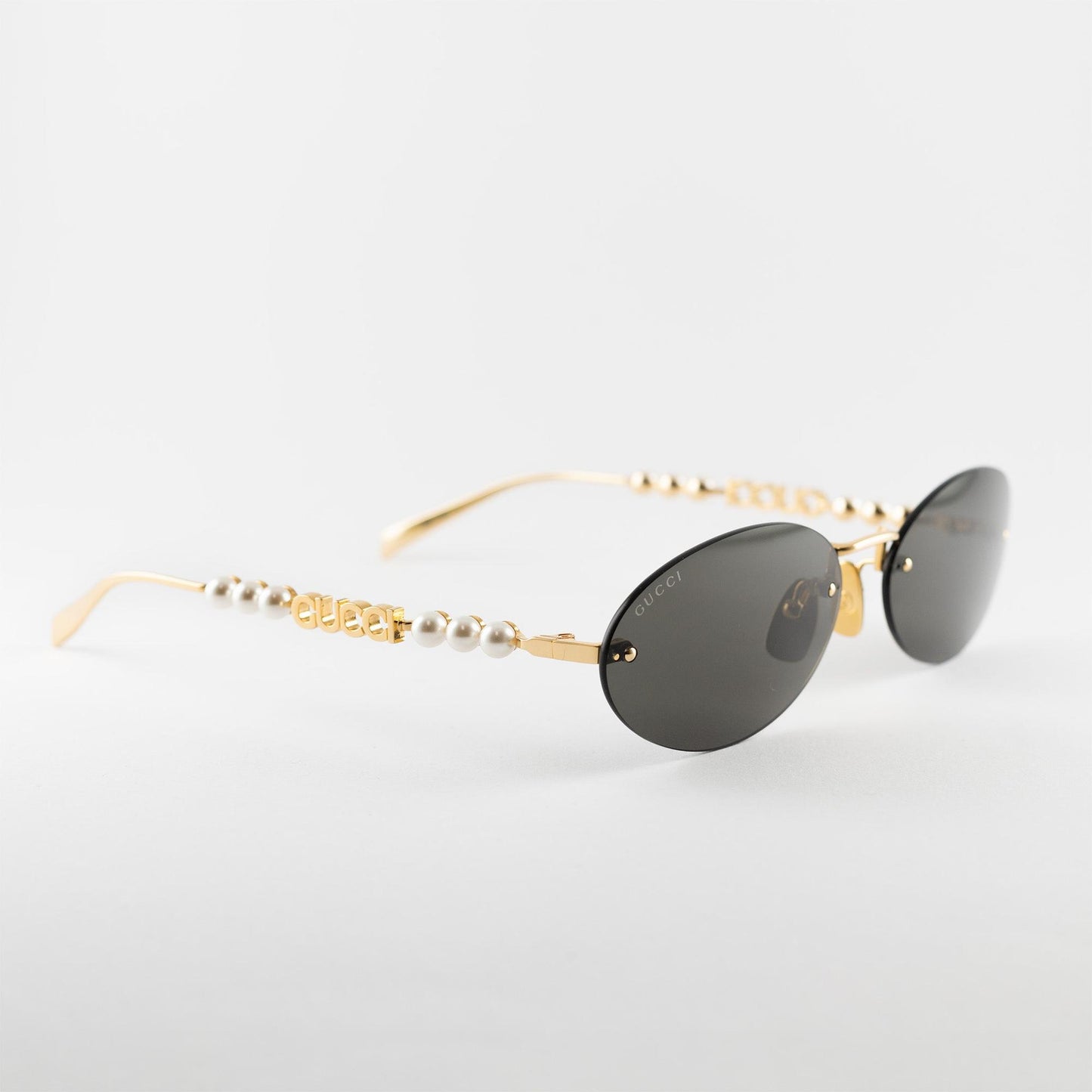 Occhiale da sole Gucci GG1922S 001 Gold - lato - Shop Ottica Mineo