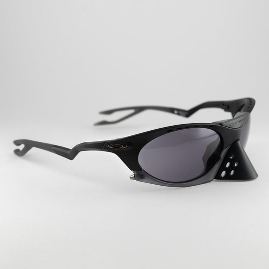 Occhiale da sole Oakley Plantaris OO9437 0163 Black - lato - Shop Ottica Mineo