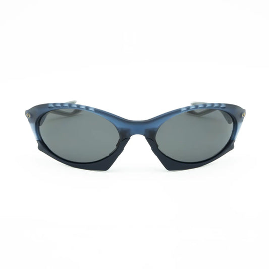 Occhiale da sole Oakley Plantaris OO9437 943709 Blu trasparente opaco - Shop Ottica Mineo