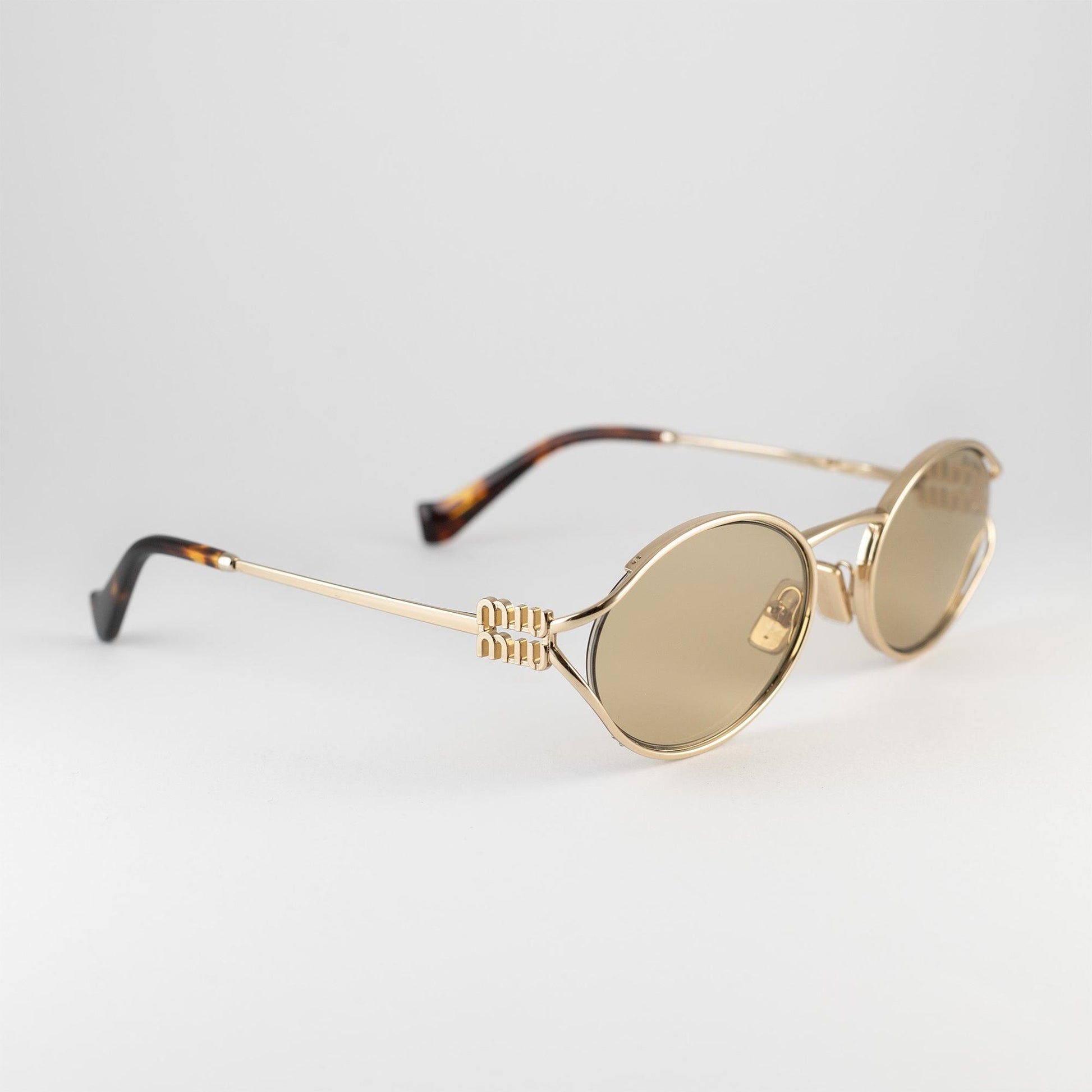 Occhiale da sole Miu Miu SMU 52Y ZVN-10R Gold - lato - Shop Ottica Mineo