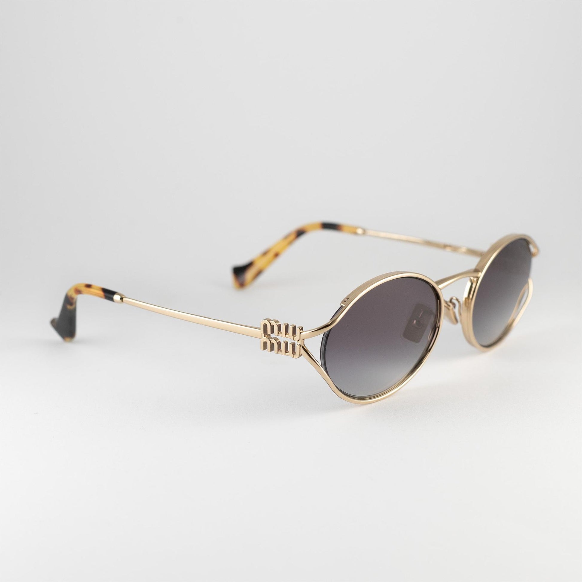 Occhiale da sole Miu Miu SMU 52Y ZVN-5D1 Gold - lato - Shop Ottica Mineo