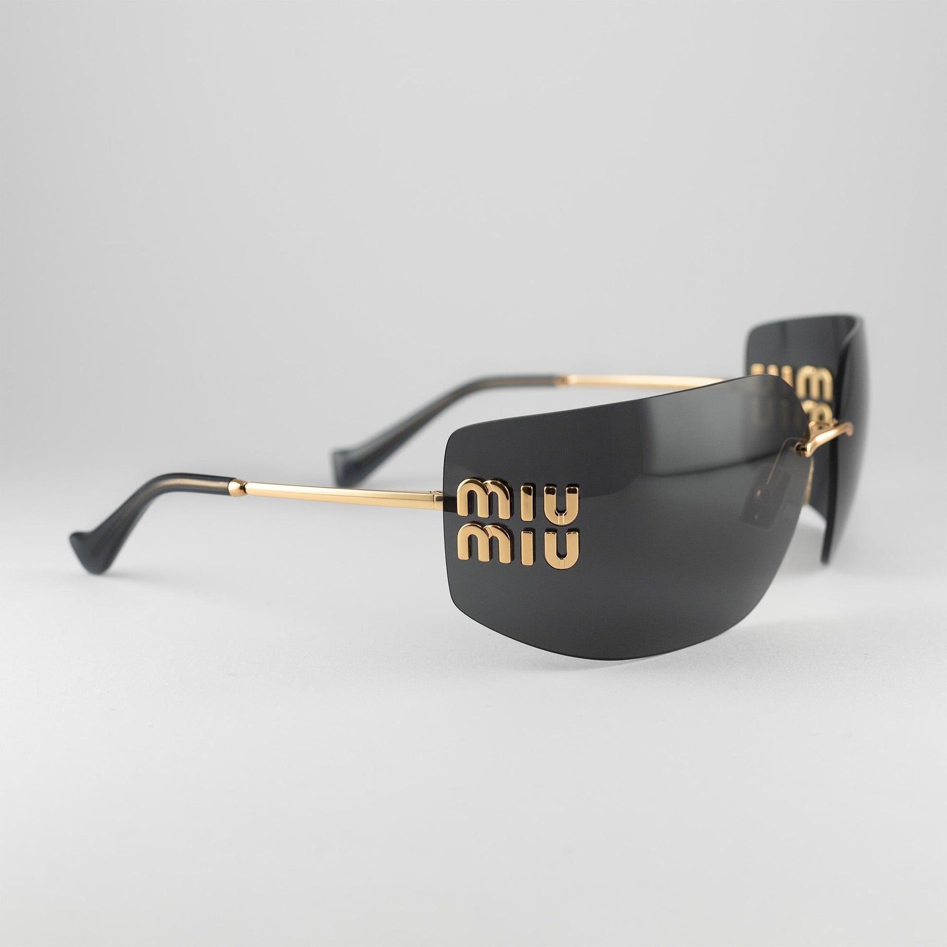 Occhiale da sole Miu Miu SMU 54YS 5AK-5S0 Black - lato - Shop Ottica Mineo