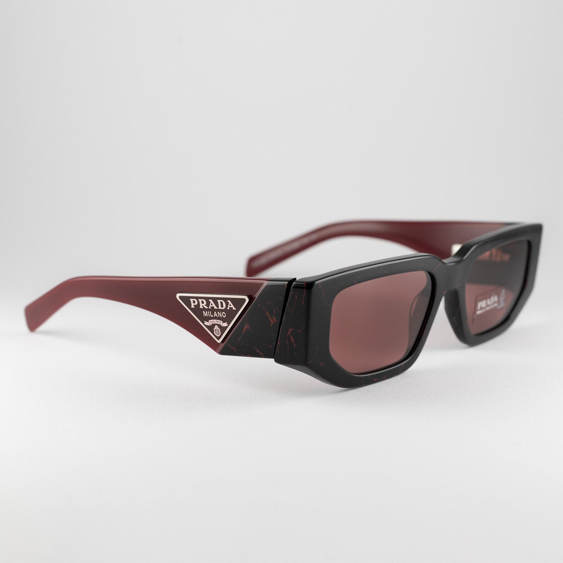 Occhiale da sole Prada SPR 09Z 11F-08S - lato - Shop Ottica Mineo