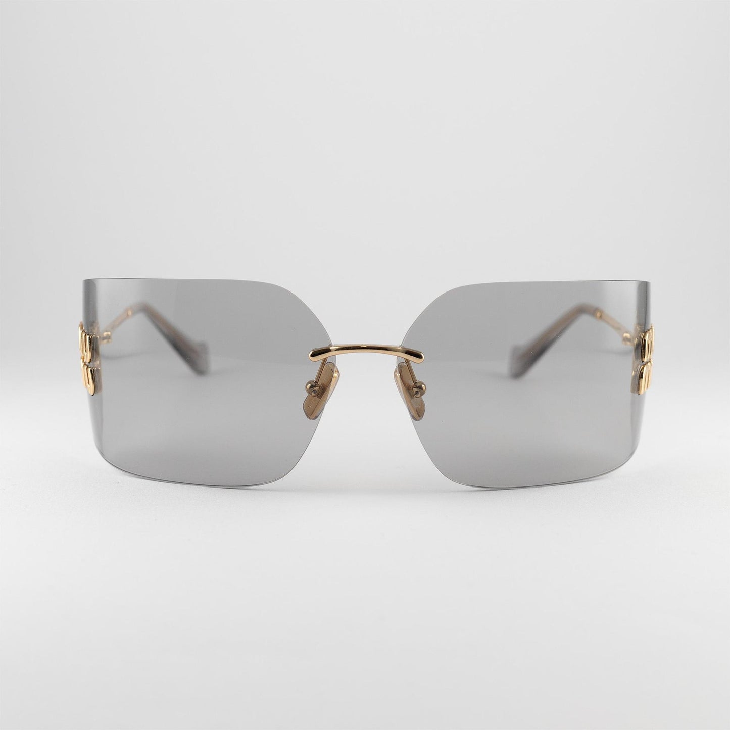 Occhiale da sole Miu Miu SMU 54YS 5AK-30B Grey - Shop Ottica Mineo